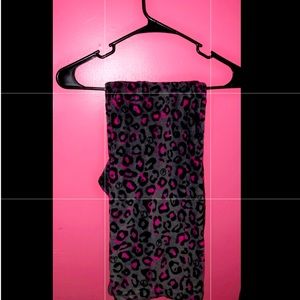 The brand is Pajama Drama in a size small